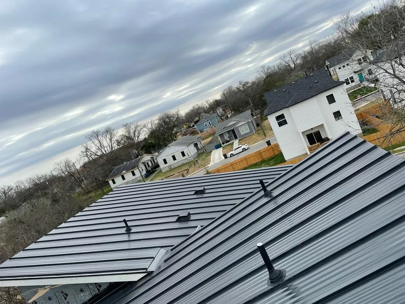 Standing seam metal roof panels with vents for Skylight Repair in Faribault